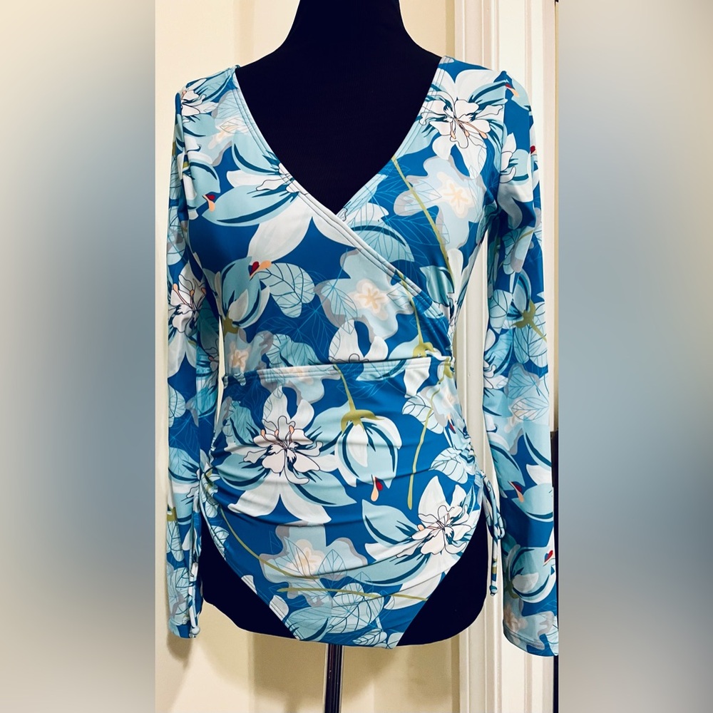 NWOT. Floral Blue Wrap Ling Sleeve Swim One Piece